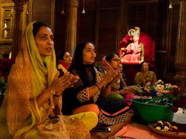 Women attending evening prayer at a Hindu temple in Nairobi. PHOTO: NEW YORK TIMES