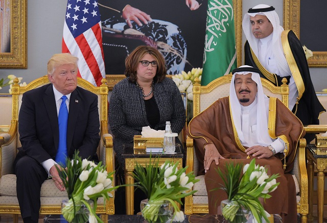 us president donald trump l and saudi arabia 039 s king salman bin abdulaziz al saud r stop for coffee in the terminal of king khalid international airport following trump 039 s arrival in riyadh photo afp