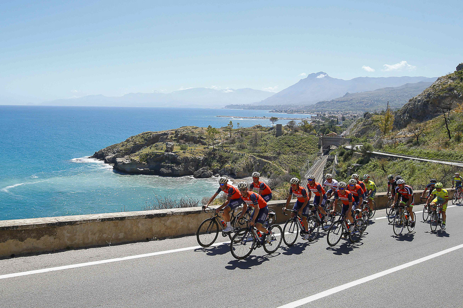 Italy's rider of team Bahrain - Merida Vincenzo Nibali (front L) and Giovanni Visconti (front R) train with teammates along the sea on the first rest day of the 100th Giro d'Italia, Tour of Italy in Trabia, Sicily. PHOTO: AFP