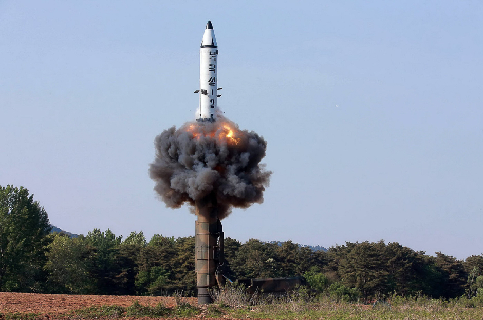 This undated picture released from North Korea's official Korean Central News Agency (KCNA) shows North Korean ground-to-ground medium-to-long range strategic ballistic missile Pukguksong-2 being launched in a test-fire. PHOTO: AFP
