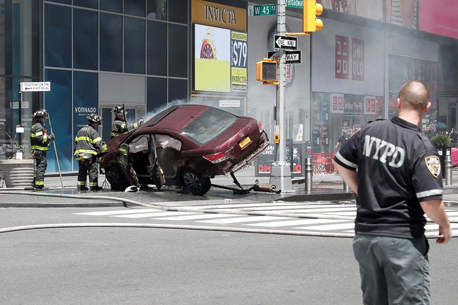 A vehicle that struck pedestrians in Times Square and later crashed is seen on the sidewalk in New York City, US. PHOTO: REUTERS