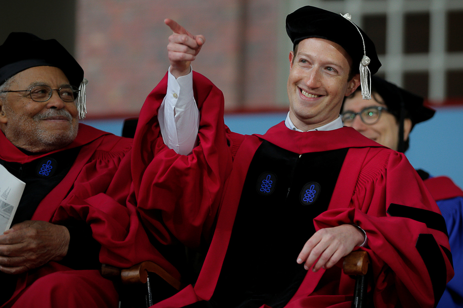 Facebook founder Mark Zuckerberg acknowledges a cheer from the crowd before receiving an honourary Doctor of Laws degree, as fellow honourary degree recipient actor James Earl Jones (L) looks on, during the 366th Commencement Exercises at Harvard University in Cambridge, Massachusetts, US. PHOTO: REUTERS