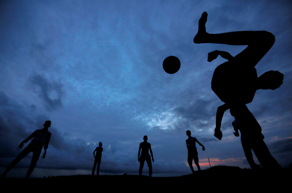 A boy kicks a ball as he plays soccer with his friends at Galle Dutch Fort in Galle, Sri Lanka. PHOTO: REUTERS