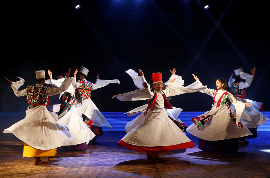 Pakistani dancer and choreographer Munawar Chao (C) and his troupe perform a Sufi dance during the dance festival in Karachi. PHOTO: REUTERS