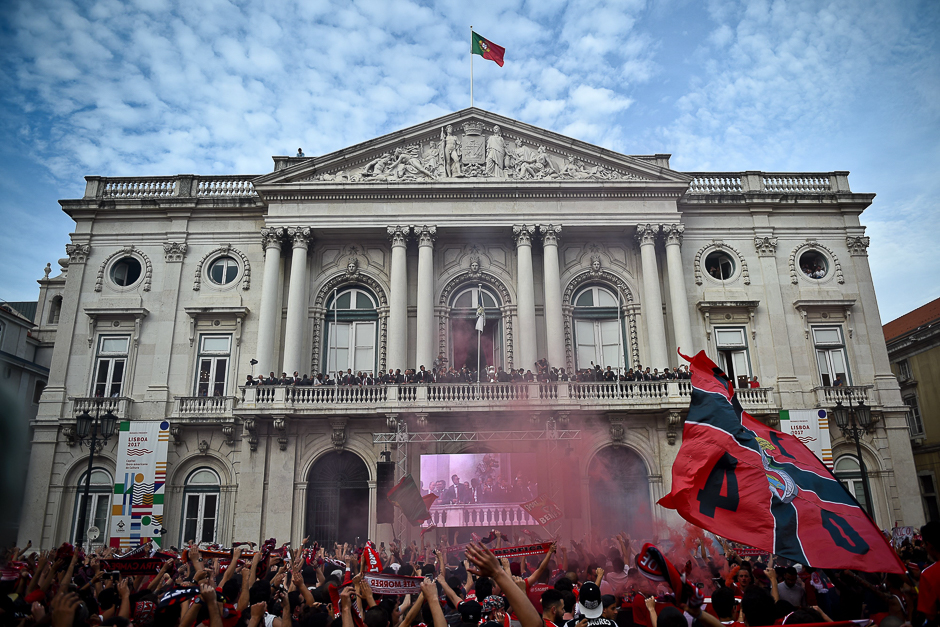 Supporters celebrate as Benfica football team raise their trophy at Lisbon's City Hall following their victory in the 2016-2017 Portuguese League championship, the fourth in a row and their 36th Portuguese championship. PHOTO: AFP