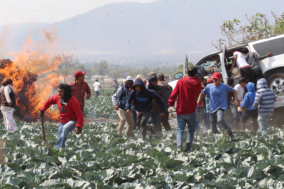 Residents vandalise a vehicle seized by military personnel during a protest against the army after an incident with suspected oil thieves in the community of El Palmarito, on the outskirts of Puebla, Mexico. PHOTO: REUTERS