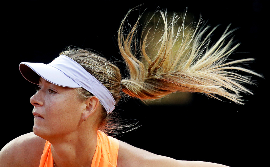 Tennis - WTA - Rome Open - Maria Sharapova of Russia v Mirjana Lucic-Baroni of Croatia - Rome, Italy. Sharapova serves the ball. PHOTO: REUTERS