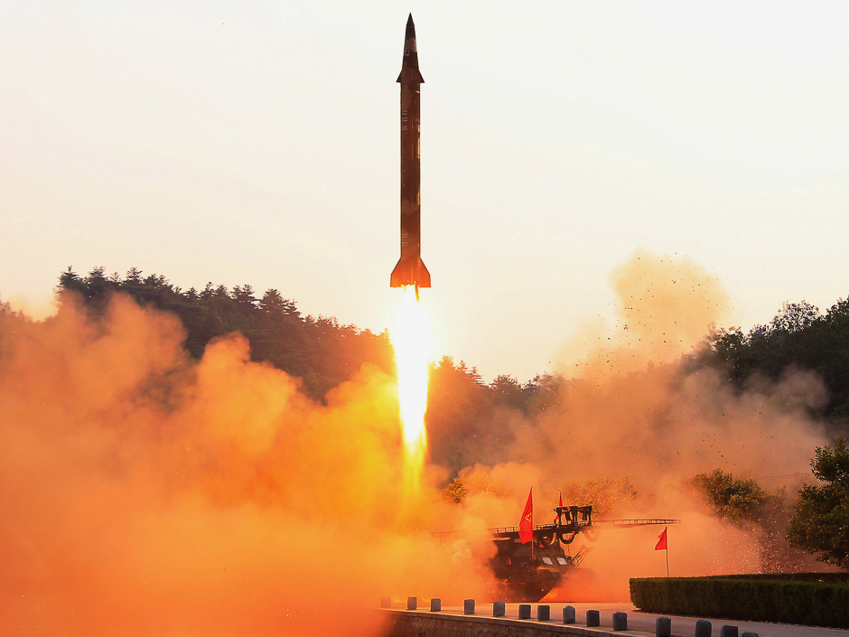 A ballistic rocket is test-fired through a precision control guidance system in this undated photo released by North Korea's Korean Central News Agency (KCNA). PHOTO: REUTERS