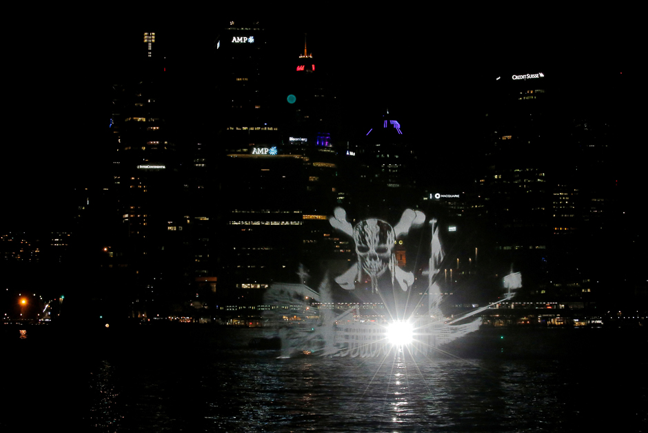 A 'ghost ship' of light projected onto a spray of water provided by fire tender floats past the central business district in Sydney, Australia, before the May 26 release of 'Dead Men Tell No Tales', the fifth installment of the Pirates of the Caribbean fantasy films. PHOTO: REUTERS