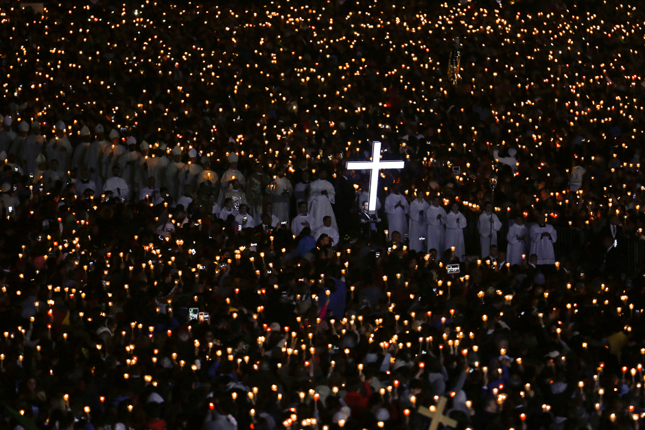 Pilgrims attend a candlelight vigil at the Catholic shrine of Fatima, Portugal. PHOTO: REUTERS