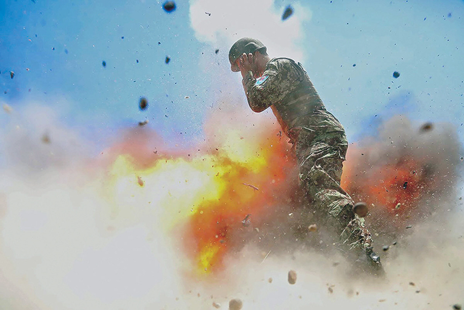A mortar tube accidentally explodes, killing four Afghan soldiers and US Army photographer who took the photo, Spc. Hilda I. Clayton, during an Afghan National Army (ANA) live-fire training exercise in Laghman Province, Afghanistan. PHOTO: REUTERS