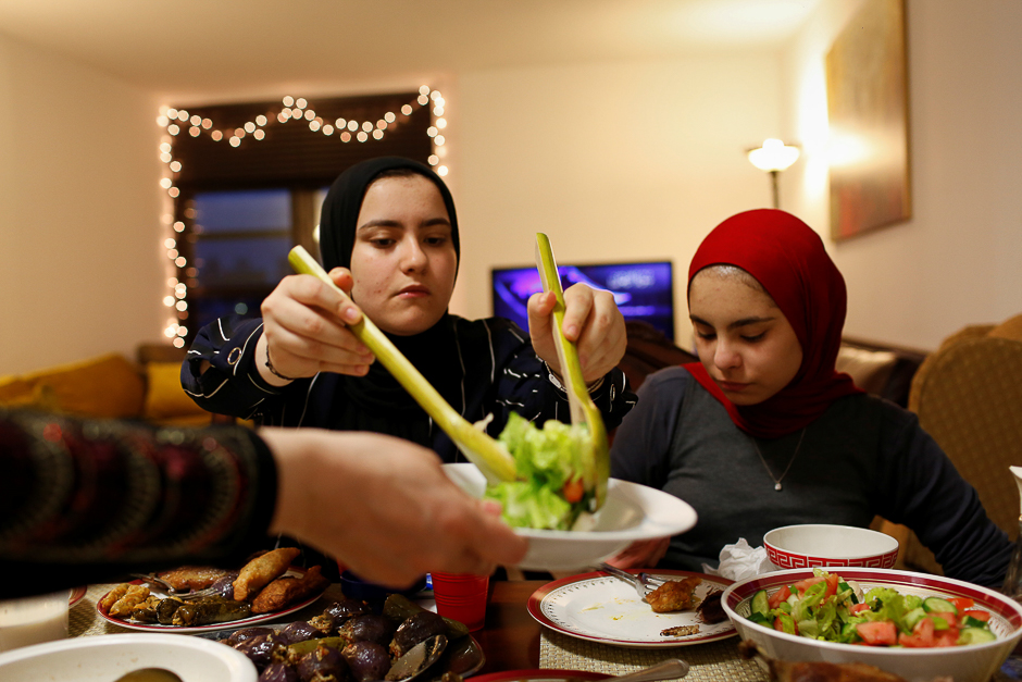 Egyptian-American Muslim Salma Zahran (L), 17, and sister Mysarah, 15, await family members as they prepare to go to the Islamic Cultural Centre to take part in Tarawih prayers on the first day of Ramadan in Manhattan, New York. PHOTO: REUTERS