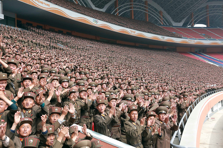 Members of the Korean People's Army cheer North Korean leader Kim Jong. PHOTO: REUTERS