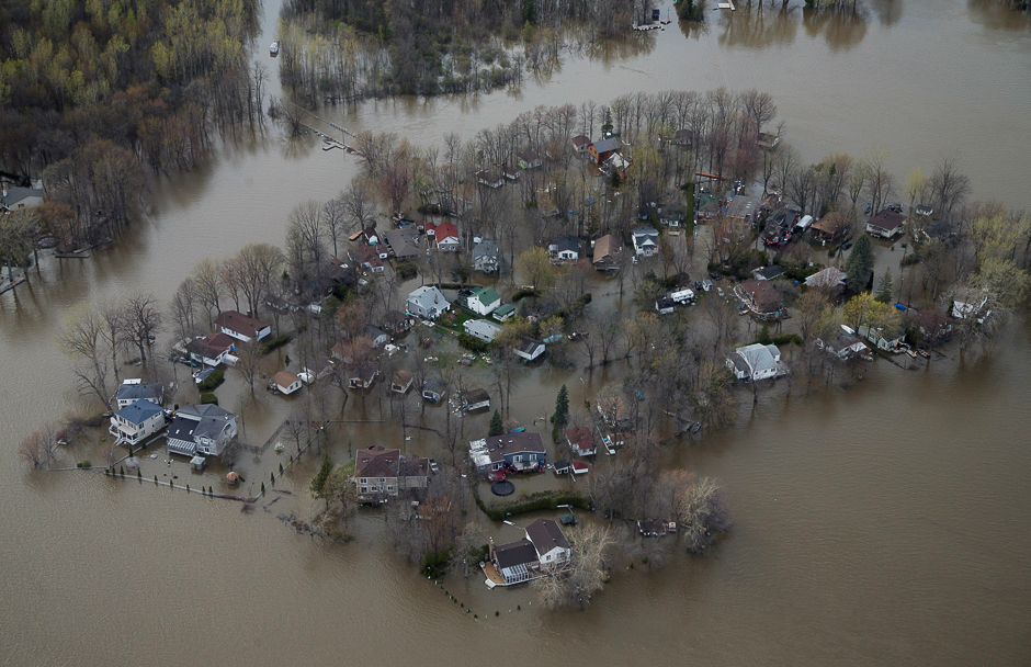 An overhead view showing the flooded residential neighbourhood of Ile Mercier, Quebec, Canada. PHOTO: REUTERS