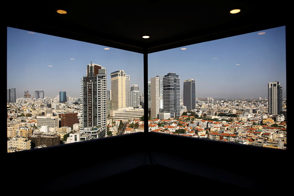 A general view of Tel Aviv's skyline is seen through a hotel window in Tel Aviv, Israel. PHOTO: REUTERS