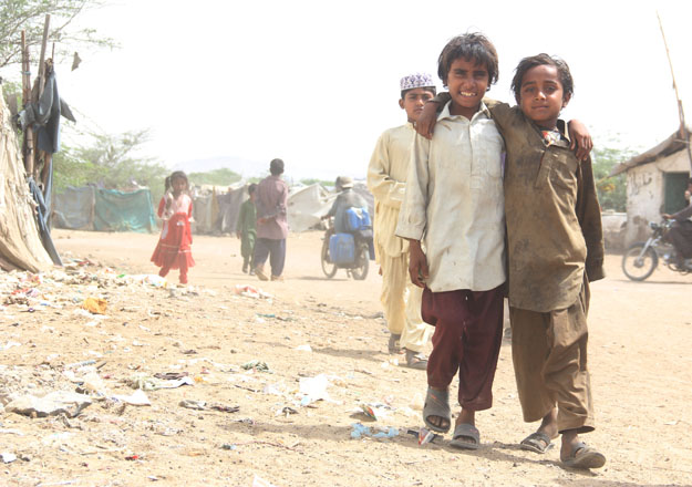 The children walk to school everyday, some of them barefoot. PHOTO: AYESHA MIR/EXPRESS