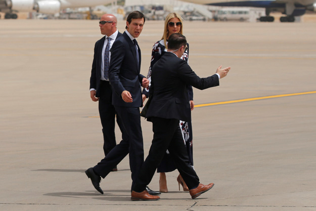 White House senior advisor Jared Kushner (C) and his wife Ivanka Trump walk on the tarmac after arriving with U.S. President Donald Trump aboard Air Force One at King Khalid International Airport in Riyadh, Saudi Arabia May 20, 2017. PHOTO: REUTERS