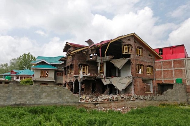 A house which was destroyed during a gun battle between security forces and a suspected militant holed up inside is pictured in Chadoora town in Budgam district May 4, 2017. Picture taken on May 4, 2017. REUTERS