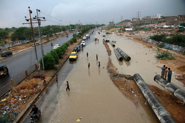 Many under construction roads and underpasses were flooded due to accumulated rainwater and poor drainage. PHOTO: ATHAR KHAN/EXPRESS