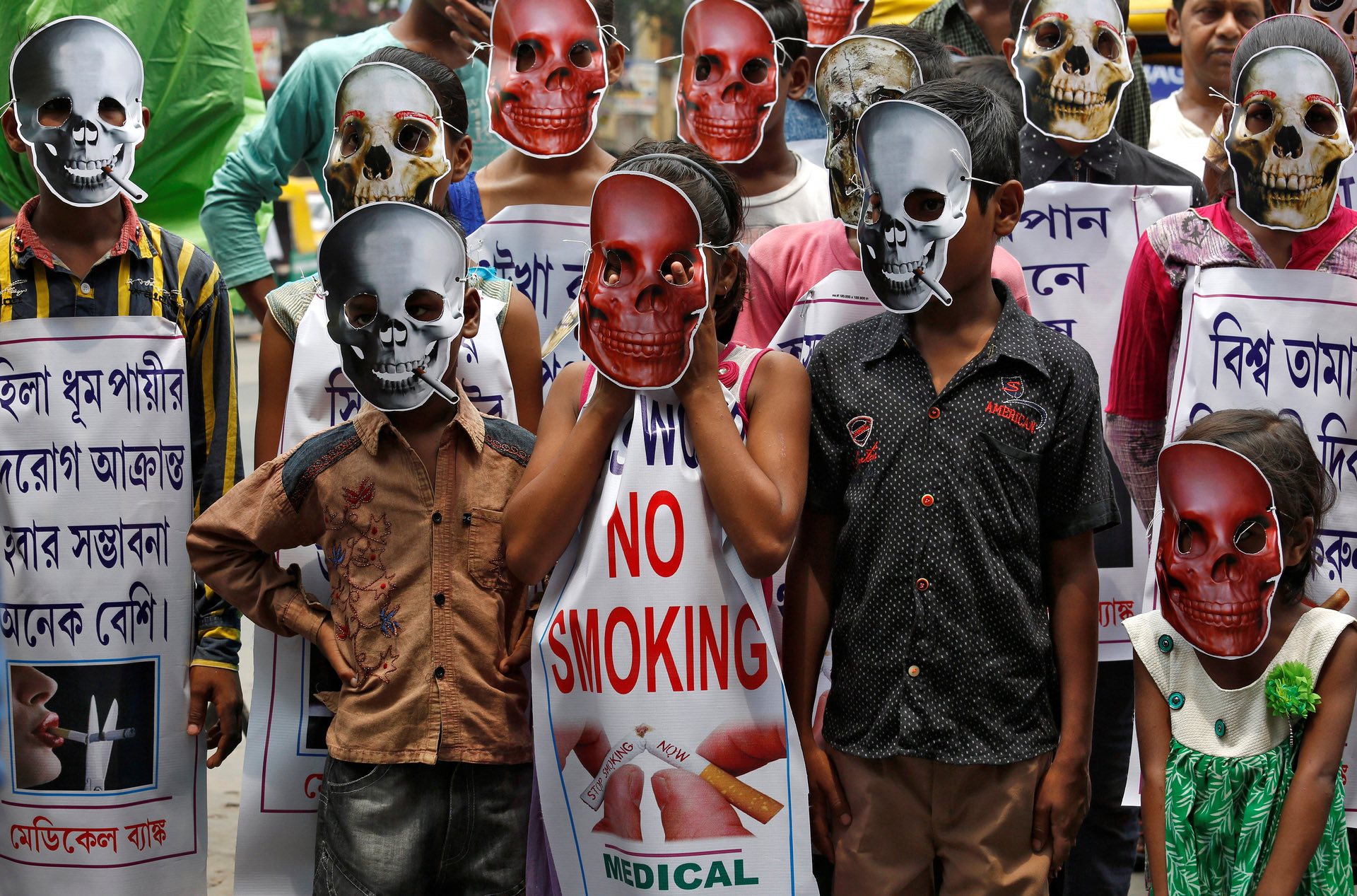 Children wearing masks at an event to mark World No Tobacco Day, Kolkata, India. PHOTO: REUTERS