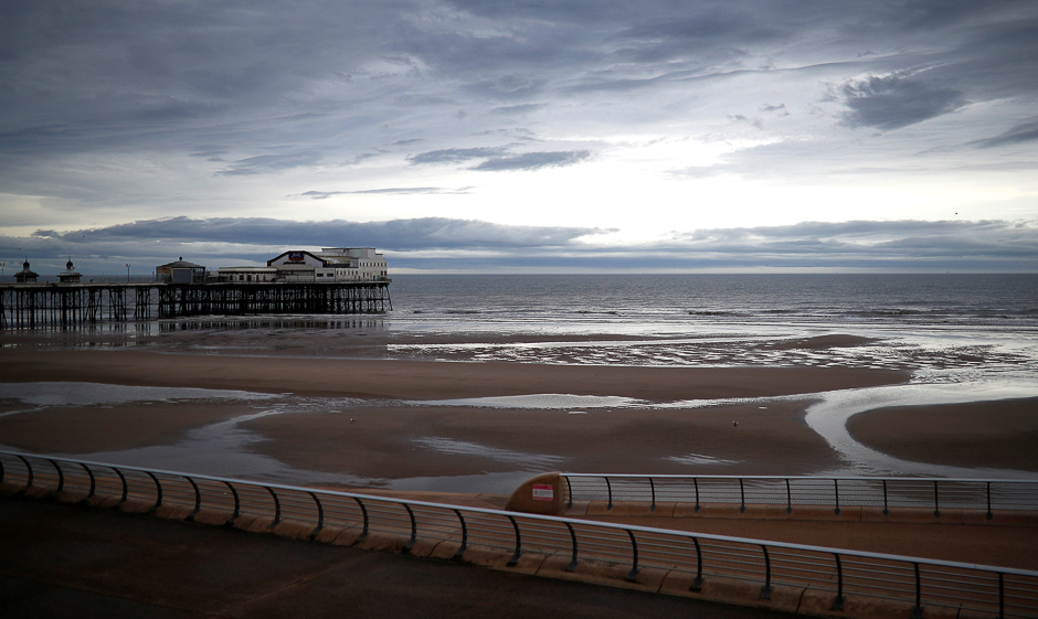 Rain clouds gather over the North Pier in Blackpool, Britain. PHOTO: REUTERS