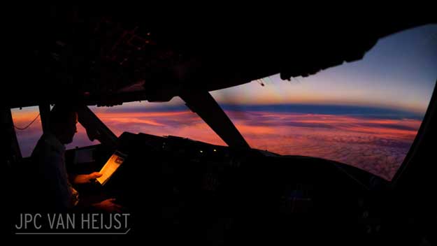 Van Heijst said of this picture: 'A beautiful sunset during a quiet moment over the Yukon, flying from Anchorage to Chicago. My colleague is quietly reading his magazine while we cruise into the night.' 