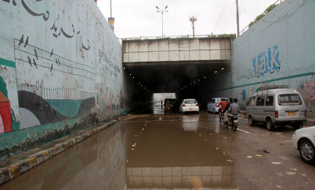 The Gharibabad Underpass was one of the eight that was flooded with rainwater on Friday. PHOTO: ATHAR KHAN/EXPRESS