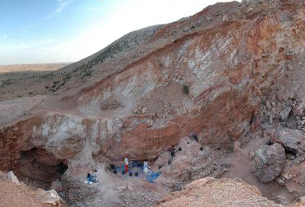 The view looking south of the Jebel Irhoud site in Morocco is shown in this undated handout photo obtained by Reuters June 7, 2017. The remaining deposits and several people excavating them are visible in the centre. PHOTO: REUTERS