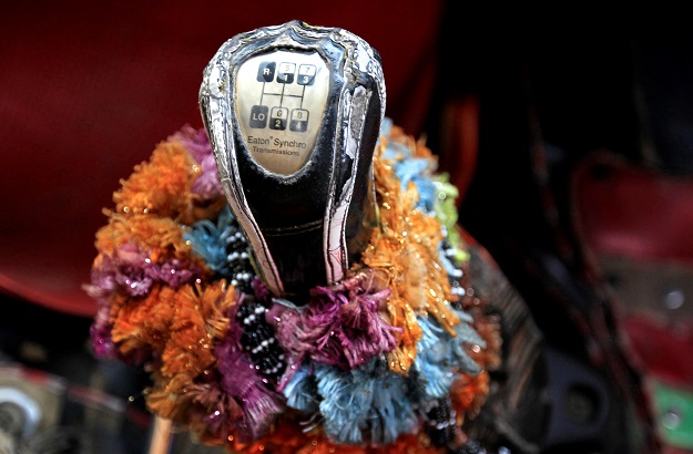 Decorations cover the gear shift of a decorated truck outside Faisalabad, Pakistan. PHOTO: REUTERS