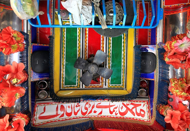 Speakers and a fan are seen in the cab of a decorated truck in Faisalabad, Pakistan. PHOTO: REUTERS