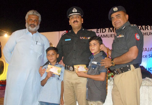 the provincial police chief attended an eidul fitr event in hyderabad with families of martyred policemen photo express