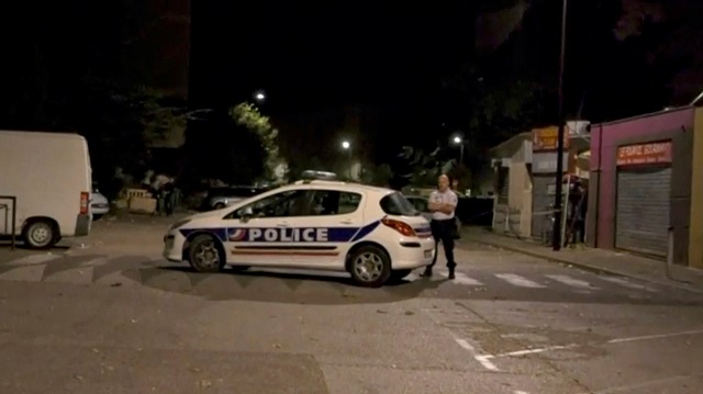 a police officer stands guard on a street near a scene of a shooting in front of a mosque in this still image from video in avignon france july 3 2017