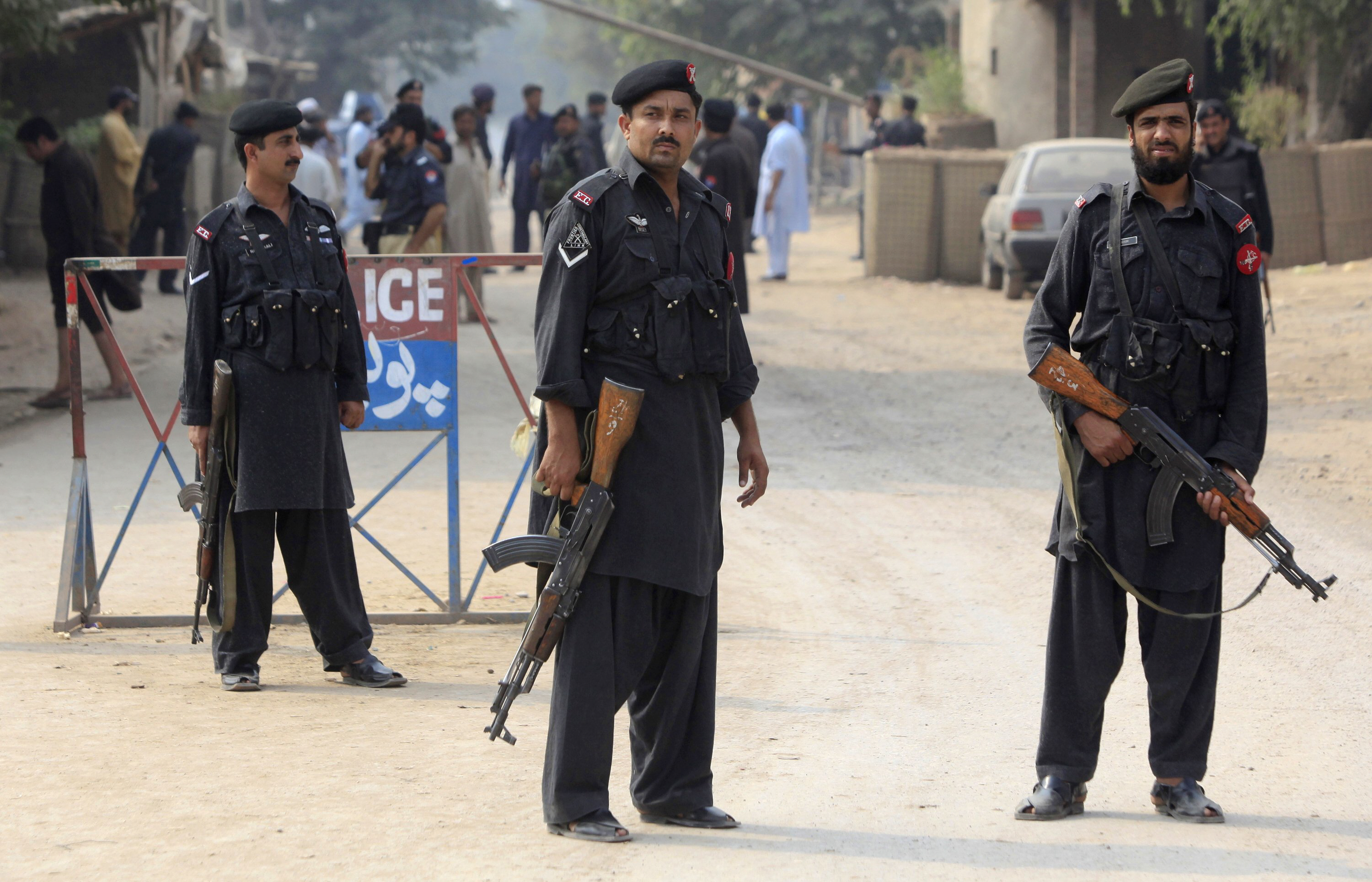 policemen stand guard in shahpur village peshawar on saturday june 24 2017 where a hideout of suspected terrorists was raided photo reuters