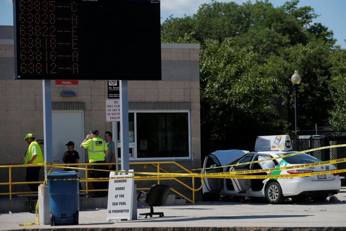 yellow tape surrounds the scene where a taxi cab crashed into a group of bystanders at the taxi pool at logan international airport in boston massachusetts us july 3 2017 photo reuters