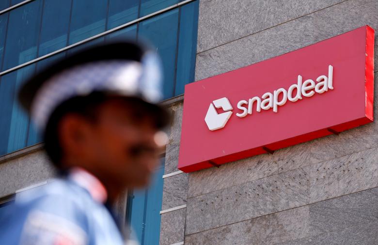 a private security guard stands at a gate of snapdeal headquarters in gurugram on the outskirts of new delhi india april 3 2017 photo reuters