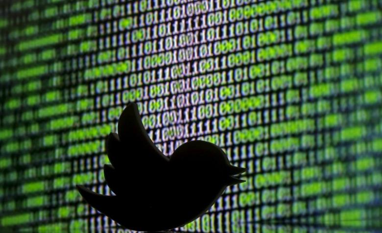 file photo   a 3d printed twitter logo is seen in front of a displayed cyber code in this illustration taken march 22 2016 photo reuters