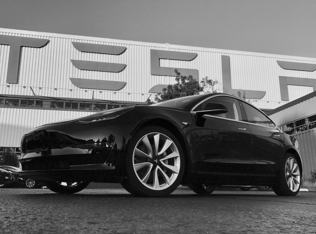 tesla ceo unveils first production model 3
