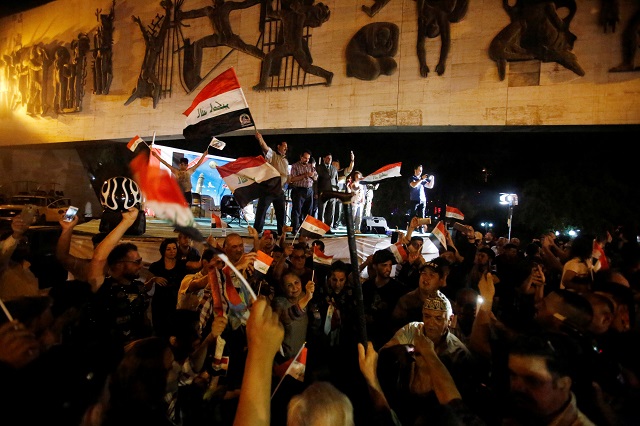 iraqis celebrate as prime minister haider al abadi announces victory over islamic state in mosul in baghdad iraq july 10 2017 photo reuters