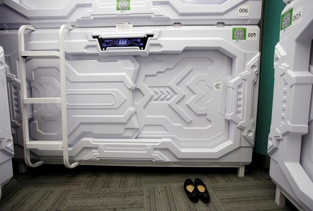 a woman 039 s shoes are placed outside a capsule bed unit at xiangshui space during lunch break in beijing 039 s zhongguancun area china july 11 2017 photo reuters