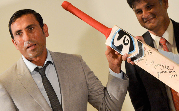 younis khan donates historic cricket bat for cause of education