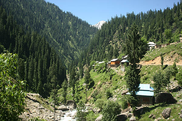 a view of tourist huts in the mountainous neelum valley in pakistan photo afp