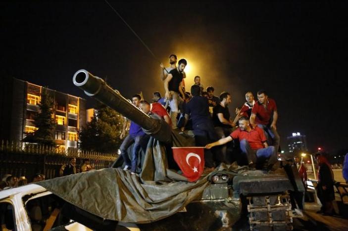 people stand on a turkish army tank in ankara turkey july 16 2016 photo reuters