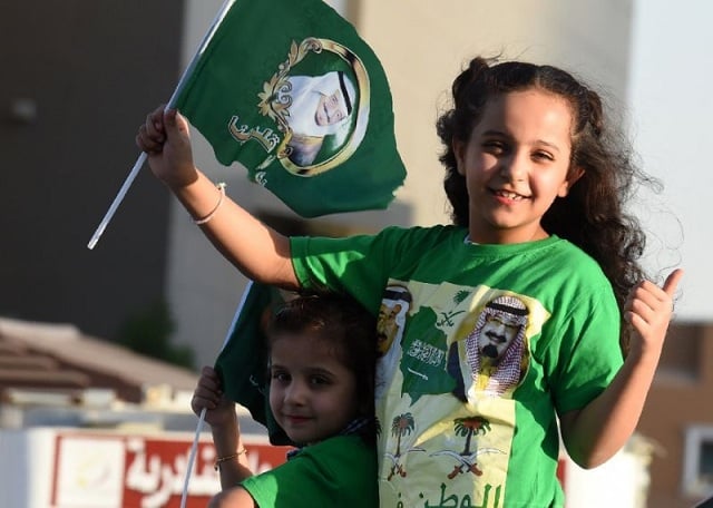 a saudi girl waves a flag during celebrations marking saudi arabian national day in riyadh on september 23 2016 photo afp