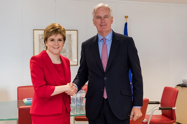 eu chief brexit negotiator michel barnier r shakes hands with scottish first minister nicola sturgeon for a meeting at the eu headquarters in brussels on july 13 2017 photo afp