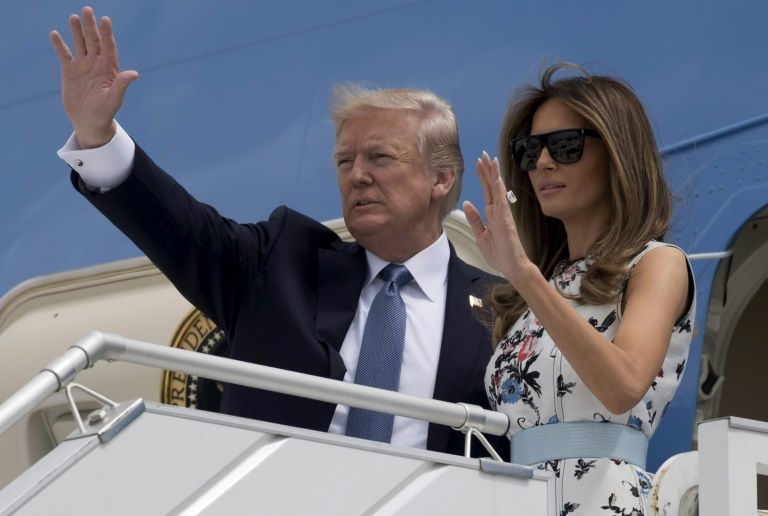 us president donald trump l and first lady melania trump board air force one photo afp