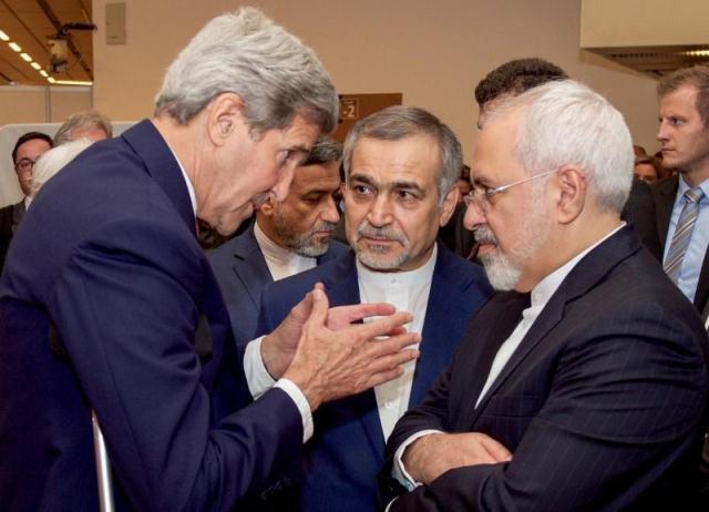 u s secretary of state john kerry l speaks with hossein fereydoun c the brother of iranian president hassan rouhani and iranian foreign minister javad zarif r before the secretary and foreign minister addressed an international press corps gathered at the austria center in vienna austria july 14 2015 photo reuters