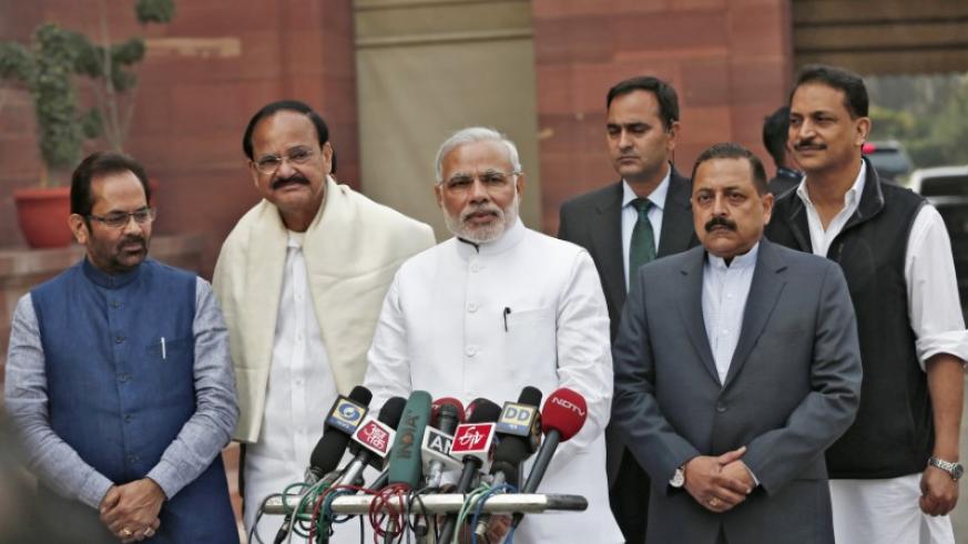 india 039 s prime minister narendra modi 3rd l speaks to the media as minister of state for parliamentary affairs mukhtar abbas naqvi l venkaiah naidu 2nd l minister of urban development jitendra singh 2nd r minister of state for prime minister office and rajiv pratap rudy r minister of state for skill development and entrepreneurship look on upon arrival on the opening day of the winter session of the indian parliament in new delhi photo reuters