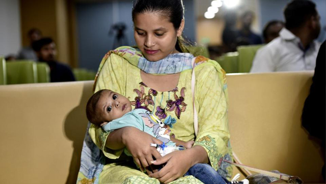 roohan with his mother at aypee hospital in noida photo ht