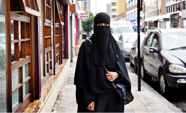 muslim woman takes legal action against uk school over veil ban