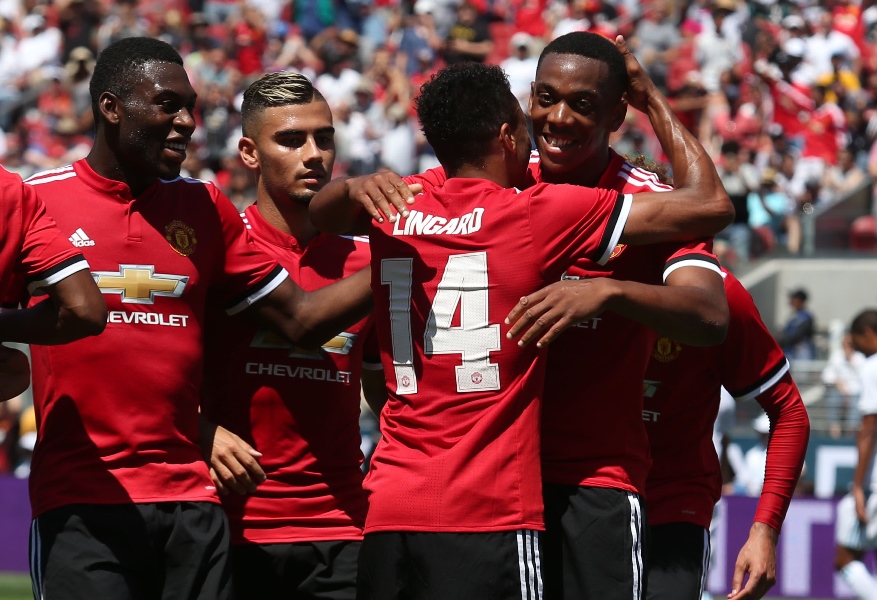 manchester united forward anthony martial right celebrates with midfielder jesse lingard after lingard scored a goal during the first half of the international champions cup match on july 23 2017 in santa clara california photo afp